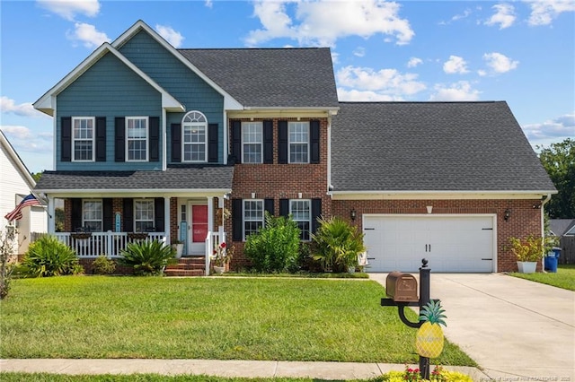 195 Hogart St, Raeford, NC 28376 - view of front facade with covered porch, a garage, driveway, a front lawn, and brick siding