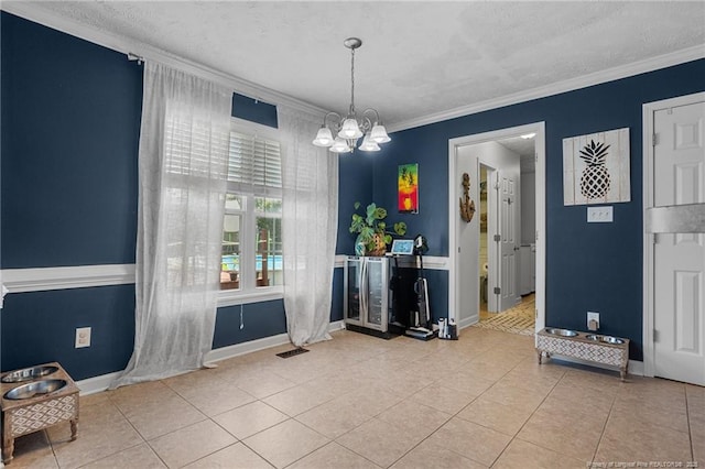 195 Hogart St, Raeford, NC 28376 - tiled dining room with a chandelier, crown molding, and a textured ceiling