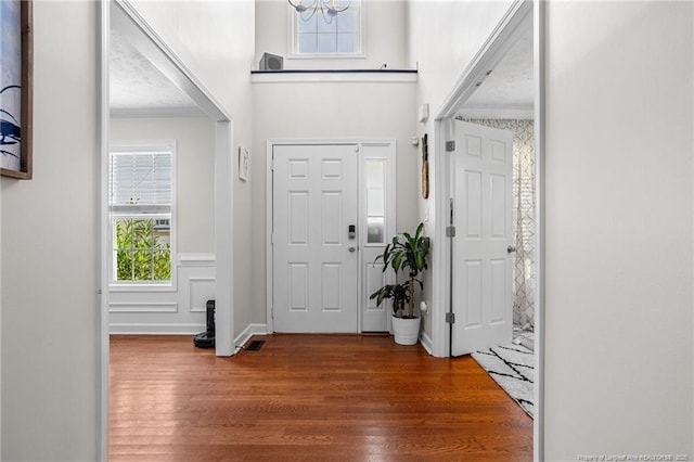 195 Hogart St, Raeford, NC 28376 - entryway featuring wood finished floors and crown molding