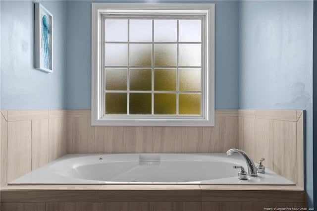 195 Hogart St, Raeford, NC 28376 - full bathroom with healthy amount of natural light and a garden tub