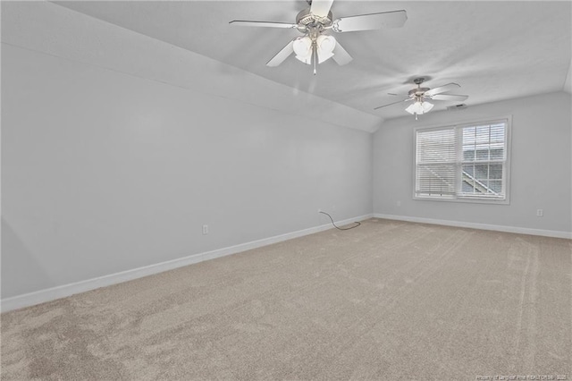 195 Hogart St, Raeford, NC 28376 - spare room with light carpet, lofted ceiling, and ceiling fan