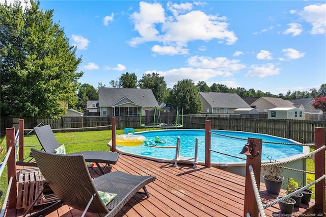 195 Hogart St, Raeford, NC 28376 - view of pool with a fenced backyard, a residential view, and a deck