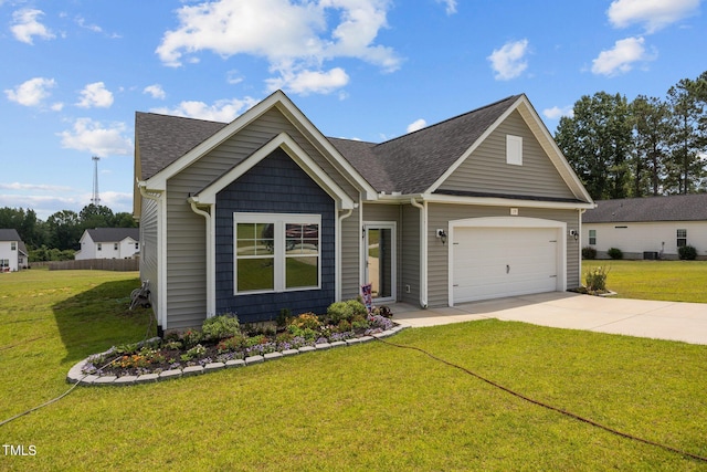 19 Linda Lou Ln Unit 19, Angier, NC 27501 - view of front facade featuring concrete driveway, roof with shingles, an attached garage, and a front lawn