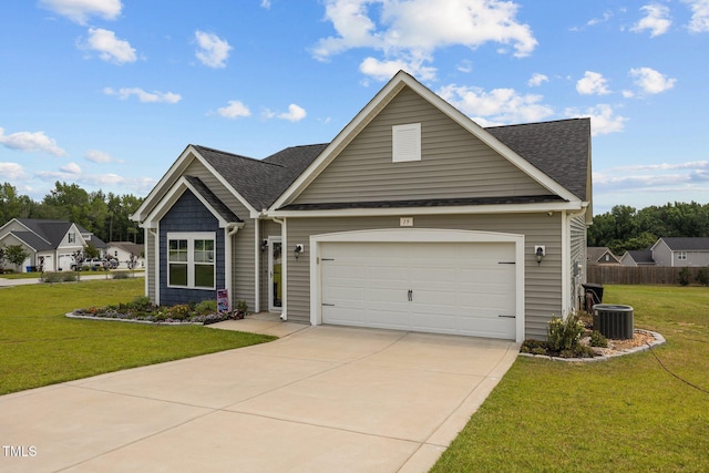 19 Linda Lou Ln Unit 19, Angier, NC 27501 - traditional-style home featuring a front yard, roof with shingles, a garage, and concrete driveway