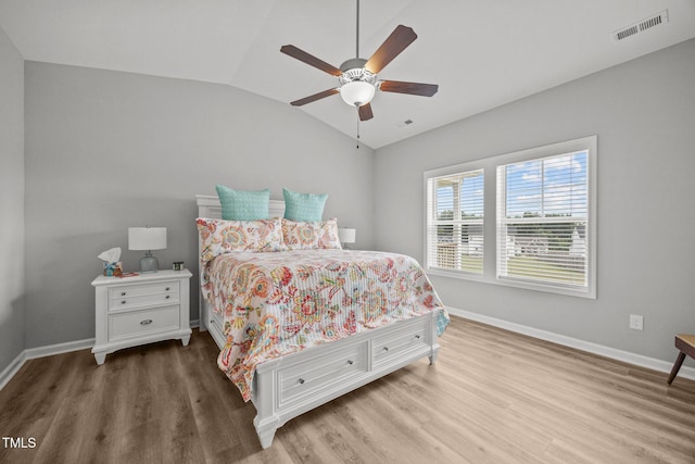 19 Linda Lou Ln Unit 19, Angier, NC 27501 - bedroom with wood finished floors, lofted ceiling, and a ceiling fan