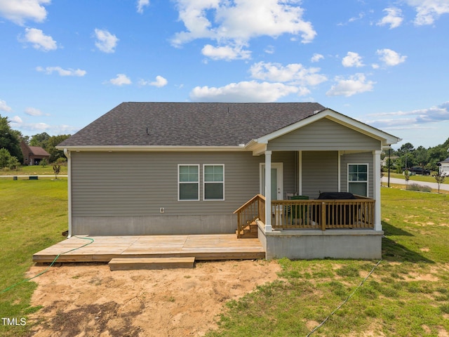 19 Linda Lou Ln Unit 19, Angier, NC 27501 - rear view of house with a yard, a deck, and a shingled roof