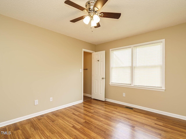 635 Raymond Dr, Wendell, NC 27591 - empty room featuring wood finished floors and ceiling fan