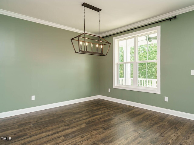 2013 Woodbluff Dr, Wendell, NC 27591 - spare room featuring crown molding, a chandelier, and dark wood-style floors