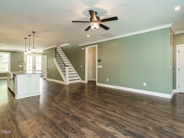 2013 Woodbluff Dr, Wendell, NC 27591 - unfurnished living room featuring ornamental molding, a ceiling fan, stairs, french doors, and dark wood-type flooring