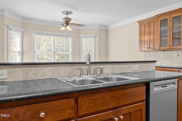 6965 Ogburn Farms Dr, Willow Springs, NC 27592 - kitchen with dishwasher, dark countertops, ornamental molding, and brown cabinets