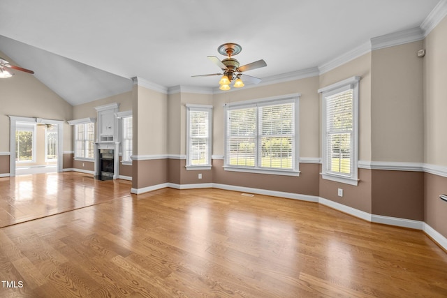 6965 Ogburn Farms Dr, Willow Springs, NC 27592 - unfurnished living room with ceiling fan, wood finished floors, and a fireplace