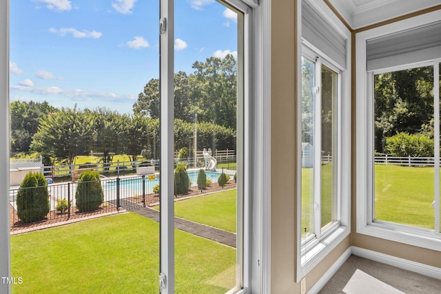 6965 Ogburn Farms Dr, Willow Springs, NC 27592 - unfurnished sunroom featuring carpet and ornamental molding
