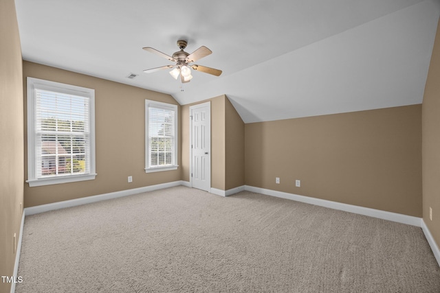 6965 Ogburn Farms Dr, Willow Springs, NC 27592 - additional living space with a ceiling fan, lofted ceiling, and light colored carpet