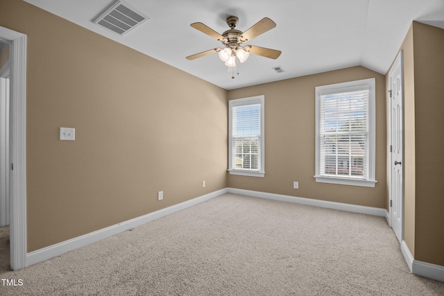6965 Ogburn Farms Dr, Willow Springs, NC 27592 - spare room with light colored carpet, ceiling fan, and lofted ceiling