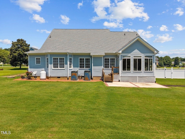 6965 Ogburn Farms Dr, Willow Springs, NC 27592 - back of property with a patio, roof with shingles, and crawl space