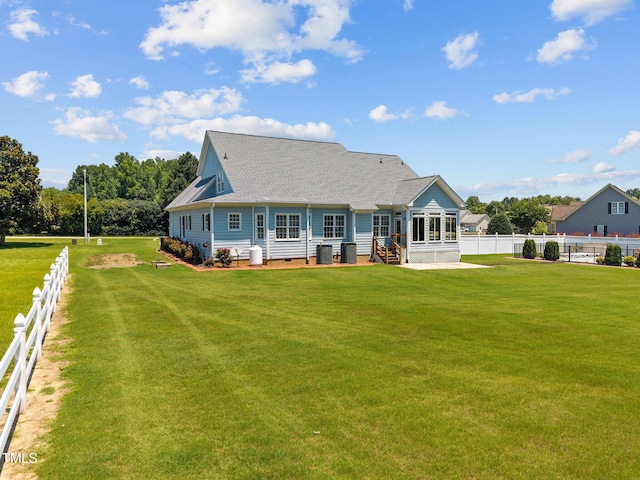 6965 Ogburn Farms Dr, Willow Springs, NC 27592 - back of property with a patio area, a fenced backyard, roof with shingles, crawl space, and entry steps