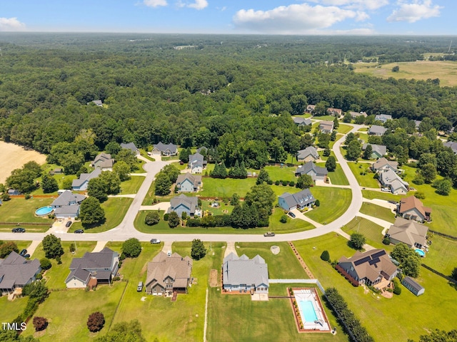 6965 Ogburn Farms Dr, Willow Springs, NC 27592 - aerial view of residential area featuring a forest
