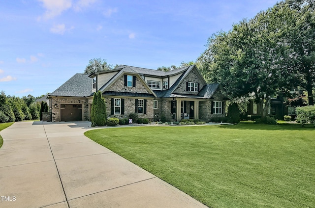 39 Wood Stork Ct, Clayton, NC 27520 - view of front of home with a front lawn, a garage, concrete driveway, and a shingled roof