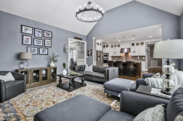 39 Wood Stork Ct, Clayton, NC 27520 - living area with a chandelier, dark wood-type flooring, recessed lighting, and high vaulted ceiling