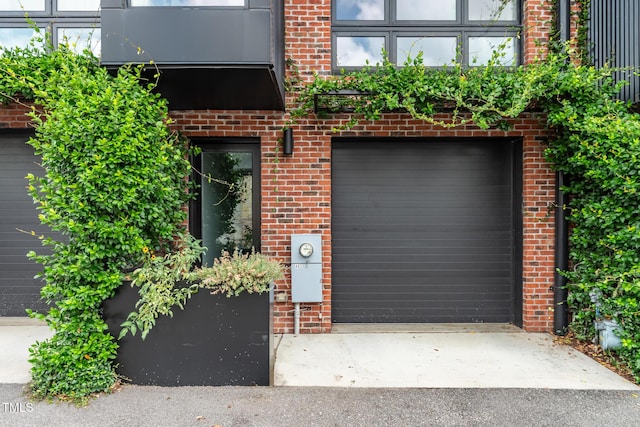 402 Chavis Way, Raleigh, NC 27601 - garage featuring driveway