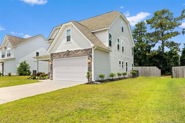 399 Springhaven Dr, Raeford, NC 28376 - view of front of house with stone siding, concrete driveway, a shingled roof, and board and batten siding