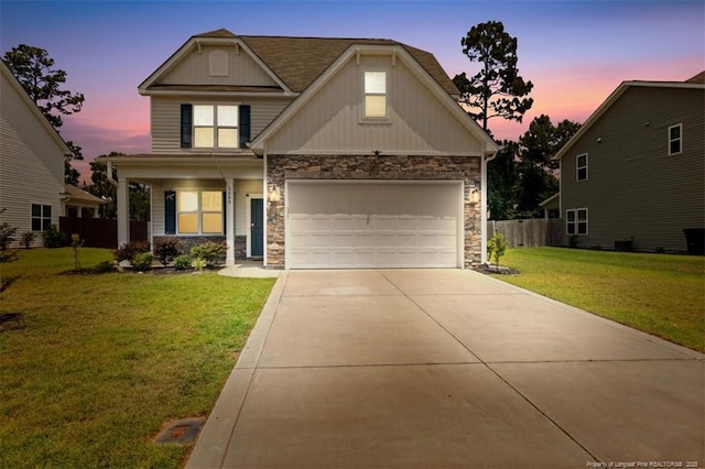 399 Springhaven Dr, Raeford, NC 28376 - craftsman inspired home with stone siding, concrete driveway, a porch, and board and batten siding