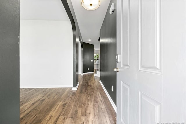 399 Springhaven Dr, Raeford, NC 28376 - hall featuring wood finished floors and arched walkways