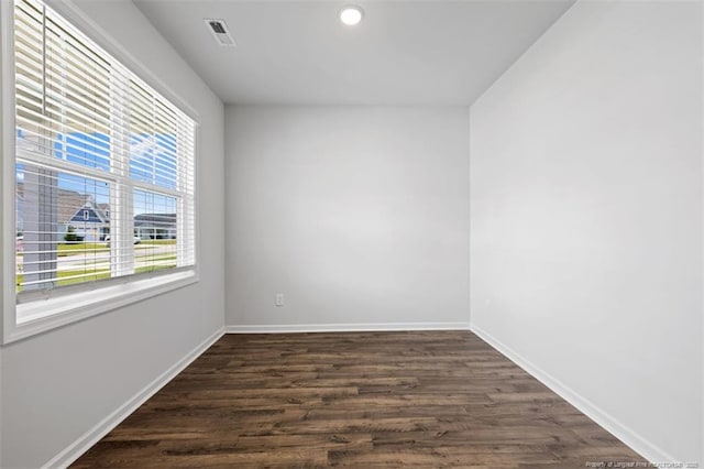 399 Springhaven Dr, Raeford, NC 28376 - empty room with dark wood-style flooring and recessed lighting