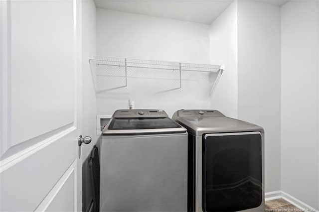 399 Springhaven Dr, Raeford, NC 28376 - washroom with separate washer and dryer and baseboards