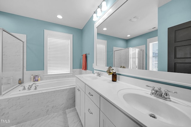 322 Tobacco Farm Way, Chapel Hill, NC 27516 - bathroom with marble look tile flooring, a bath, a shower stall, double vanity, and recessed lighting