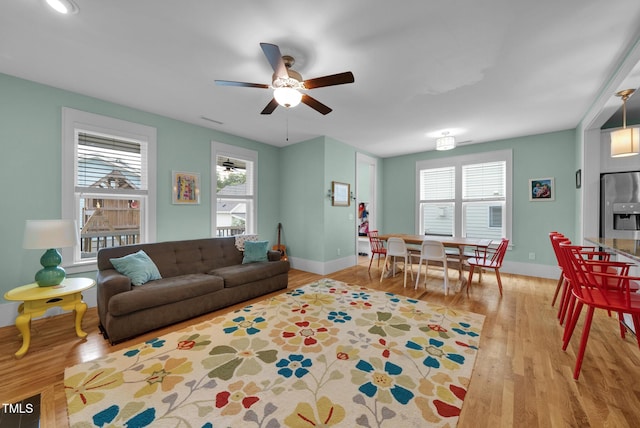 322 Tobacco Farm Way, Chapel Hill, NC 27516 - living room featuring plenty of natural light, wood finished floors, and a ceiling fan