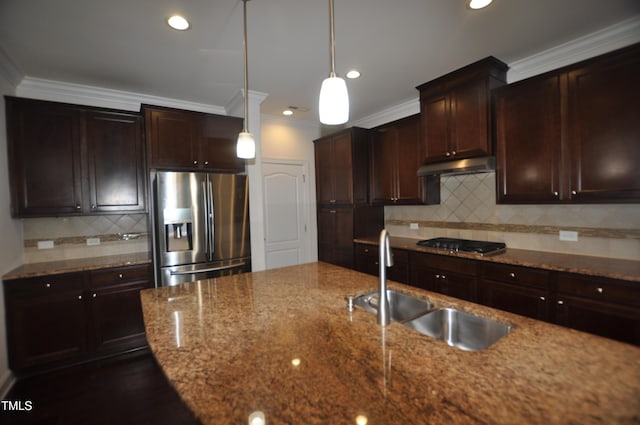536 Rockcastle Dr, Cary, NC 27519 - kitchen featuring stainless steel appliances, stone counters, decorative backsplash, under cabinet range hood, and pendant lighting