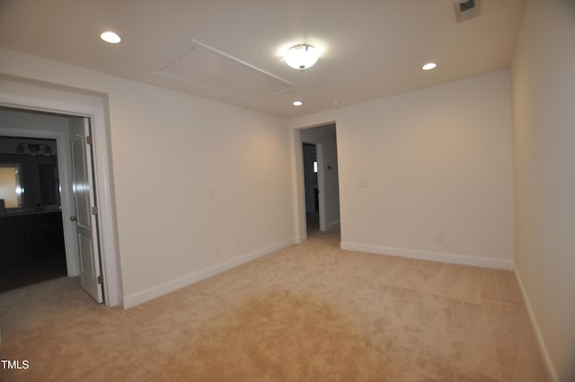 536 Rockcastle Dr, Cary, NC 27519 - spare room with light carpet, attic access, and recessed lighting