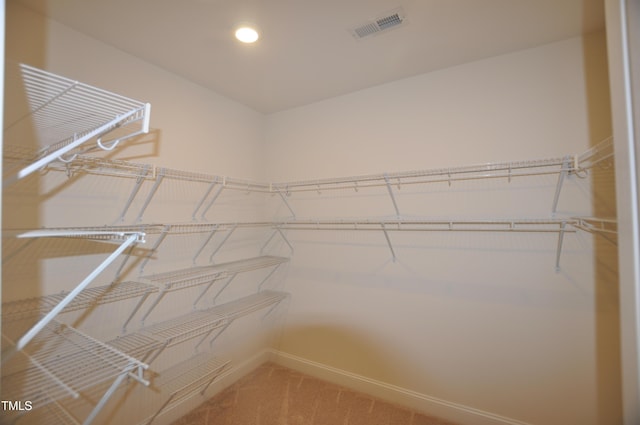 536 Rockcastle Dr, Cary, NC 27519 - spacious closet with carpet floors
