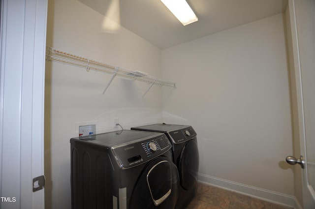536 Rockcastle Dr, Cary, NC 27519 - washroom with separate washer and dryer and baseboards