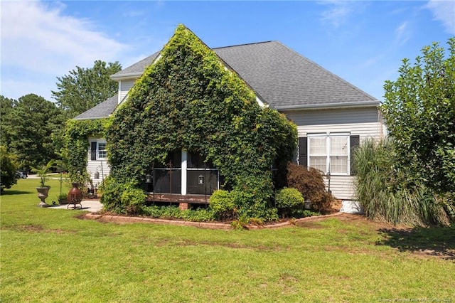115 Race Ct, Godwin, NC 28344 - view of side of home featuring a lawn and a shingled roof