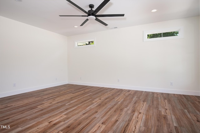 205 Gentry St, Roxboro, NC 27573 - unfurnished room with healthy amount of natural light, ceiling fan, wood finished floors, and recessed lighting