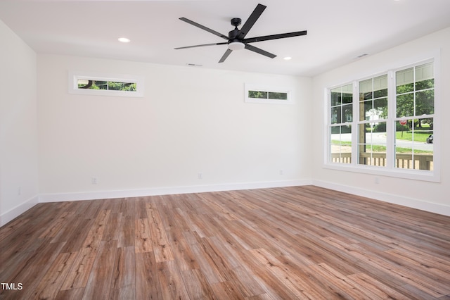 205 Gentry St, Roxboro, NC 27573 - spare room featuring plenty of natural light, wood finished floors, recessed lighting, and a ceiling fan