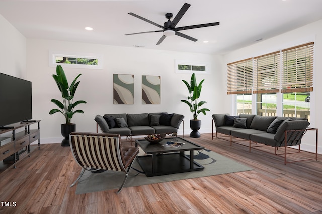 205 Gentry St, Roxboro, NC 27573 - living room featuring a ceiling fan, wood finished floors, and recessed lighting
