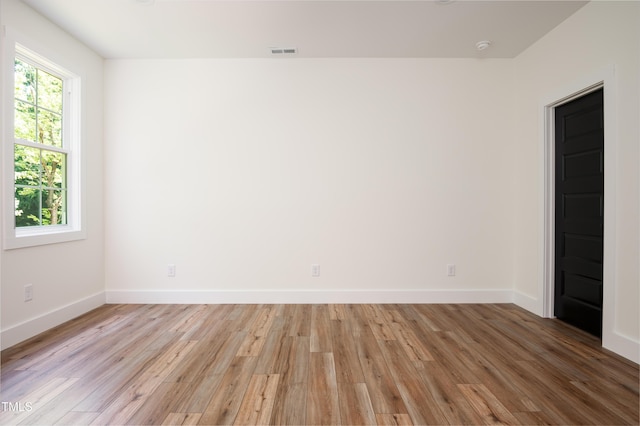 205 Gentry St, Roxboro, NC 27573 - unfurnished room featuring light wood-style floors