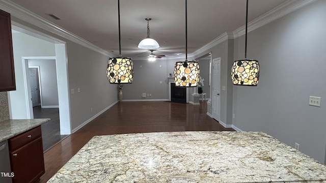 205 Bog Hill Ln, Cary, NC 27519 - unfurnished dining area with ceiling fan, crown molding, and dark wood finished floors