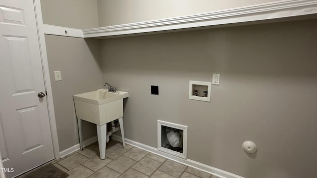 205 Bog Hill Ln, Cary, NC 27519 - laundry area featuring washer hookup and light tile patterned flooring