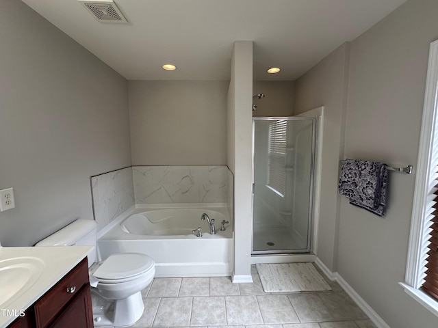 205 Bog Hill Ln, Cary, NC 27519 - full bathroom with tile patterned floors, a bath, vanity, a shower stall, and recessed lighting