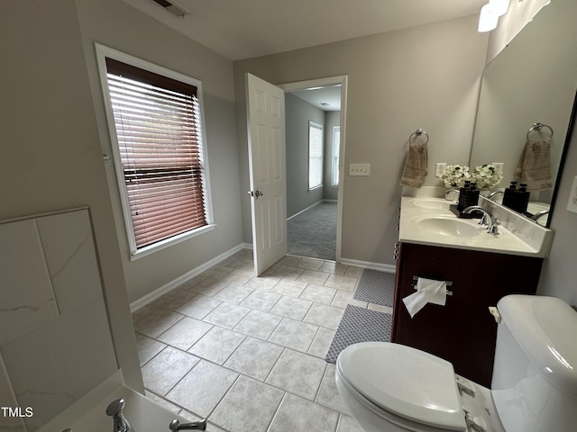 205 Bog Hill Ln, Cary, NC 27519 - bathroom with double vanity and tile patterned flooring
