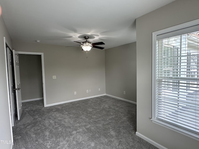 205 Bog Hill Ln, Cary, NC 27519 - unfurnished room featuring a ceiling fan and dark carpet