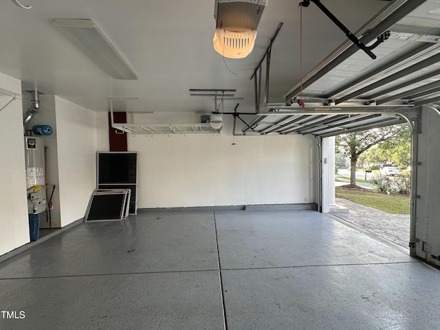205 Bog Hill Ln, Cary, NC 27519 - garage with gas water heater and a garage door opener
