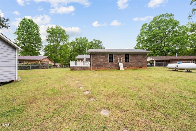 410 W Tenth St, Siler City, NC 27344 - view of yard featuring a deck
