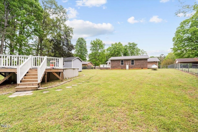 410 W Tenth St, Siler City, NC 27344 - view of yard with a deck and stairway
