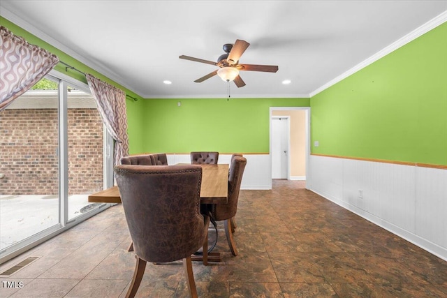 410 W Tenth St, Siler City, NC 27344 - dining room featuring a wainscoted wall, a ceiling fan, crown molding, and recessed lighting