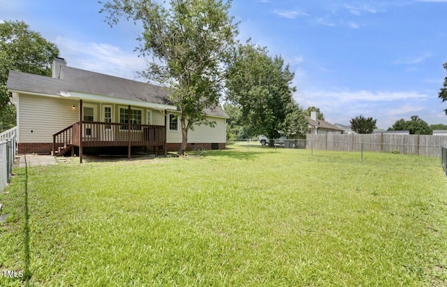 117 S Woodstone Dr, Archer Lodge, NC 27527 - fenced backyard featuring a wooden deck